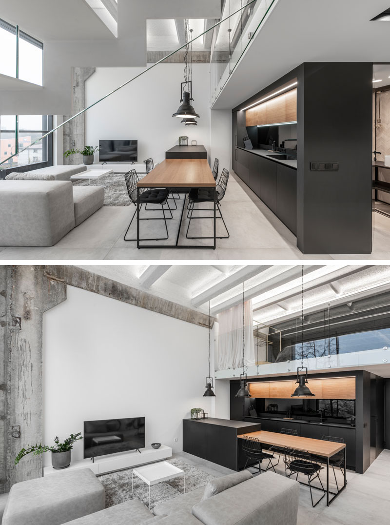 A Modern Loft Interior with a Monochrome and Wood Material Palette in Kaunas, Lithuania.