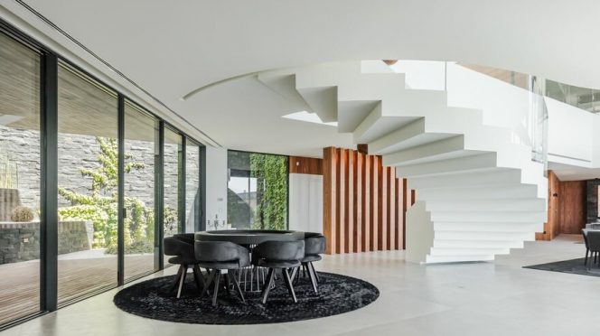 V-Shaped Concrete House by TRAMA arquitetos in Braga, Portugal