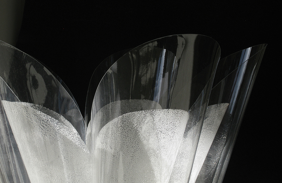 Layers of Clear Vinyl Fabric and Salt-Coated Polyester Sheet Casting the Shadow