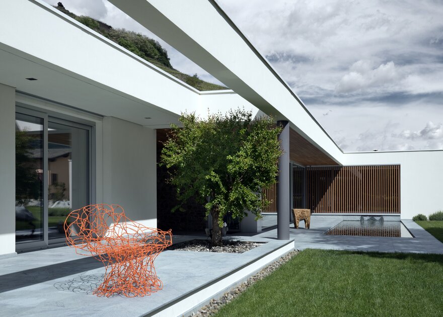 Geef House by Damilano Studio Architects in Sondrio, Italy