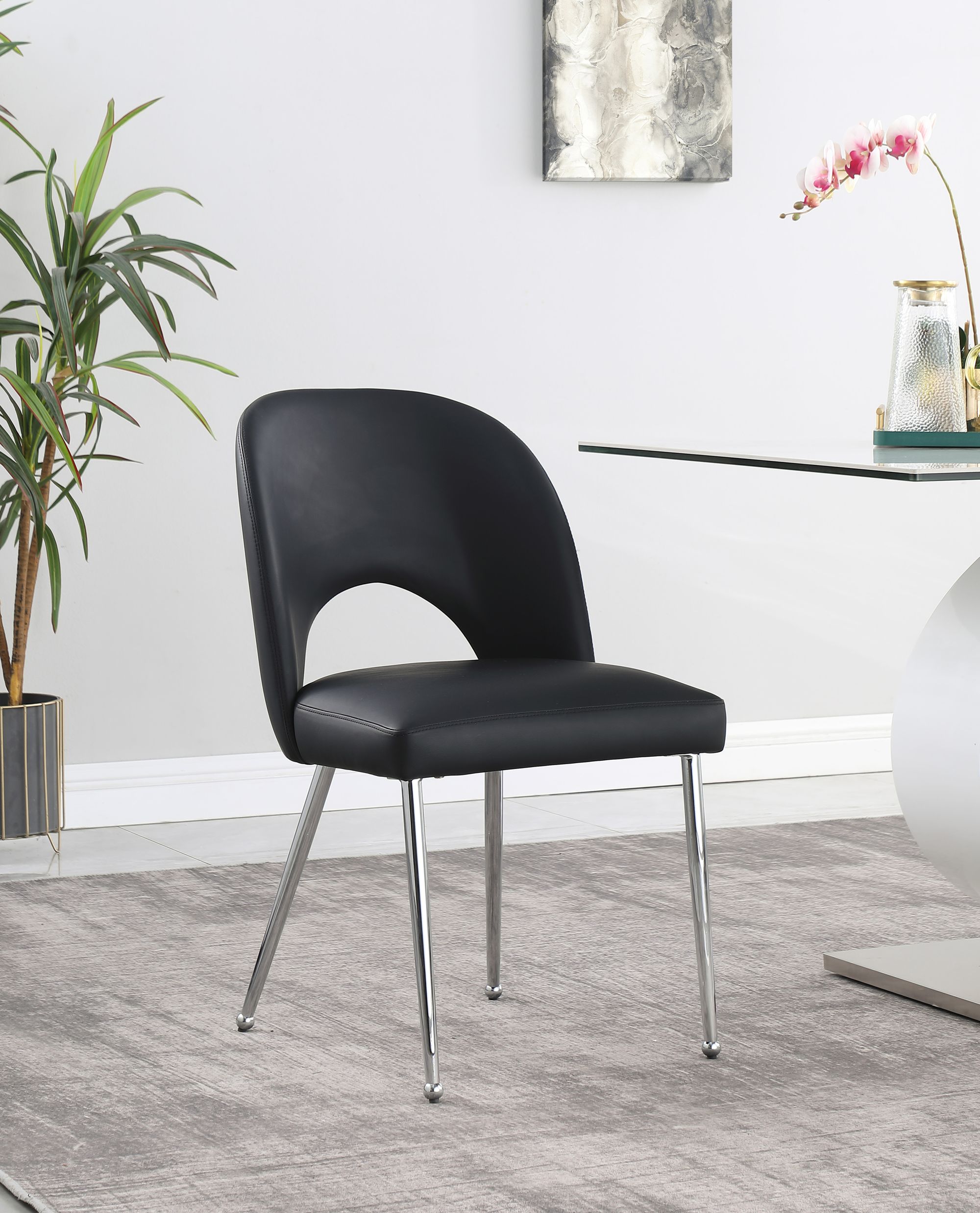 Logan Faux Leather Dining Chair with Chrome Ball Leg Design