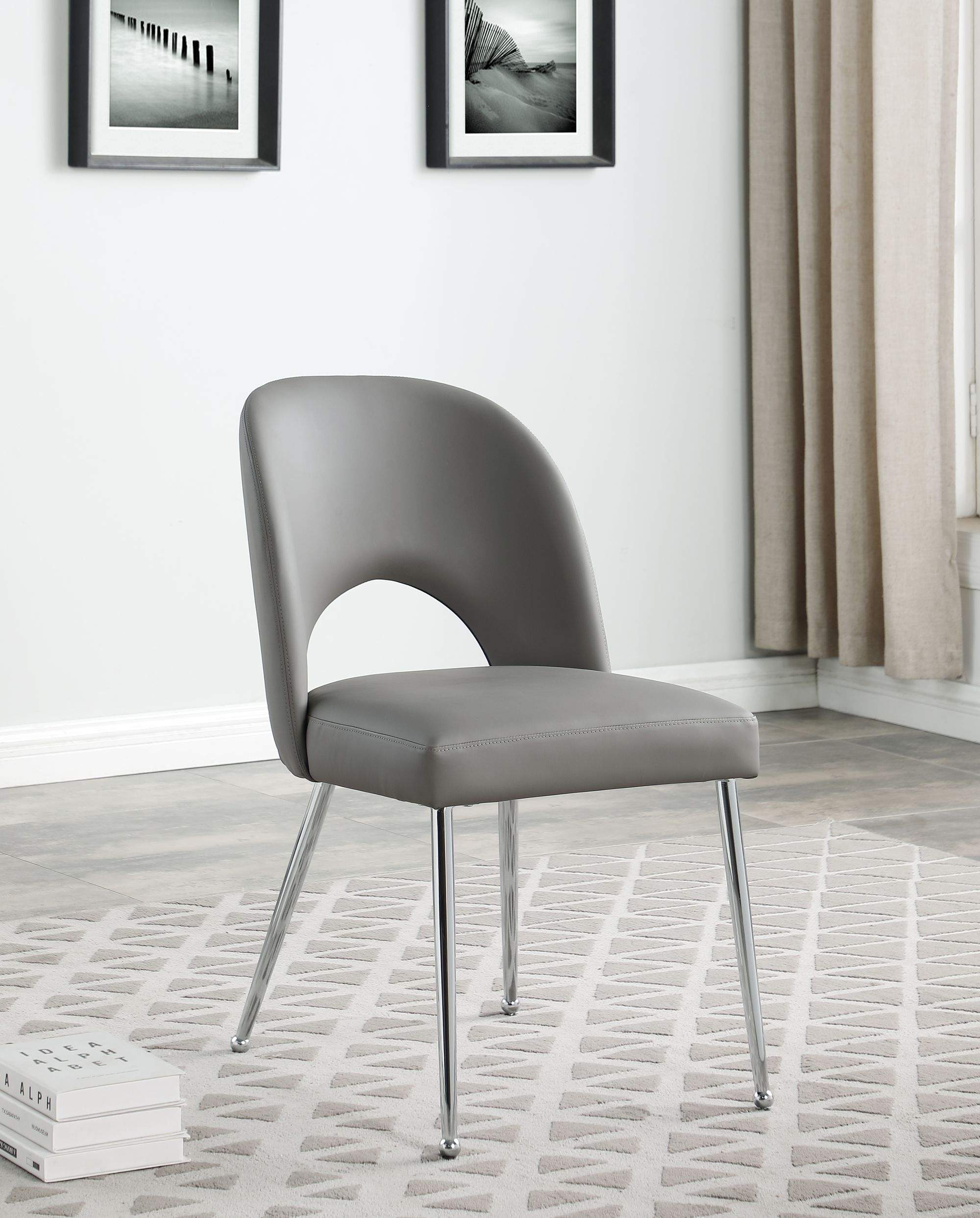 Logan Faux Leather Dining Chair with Chrome Ball Leg Design