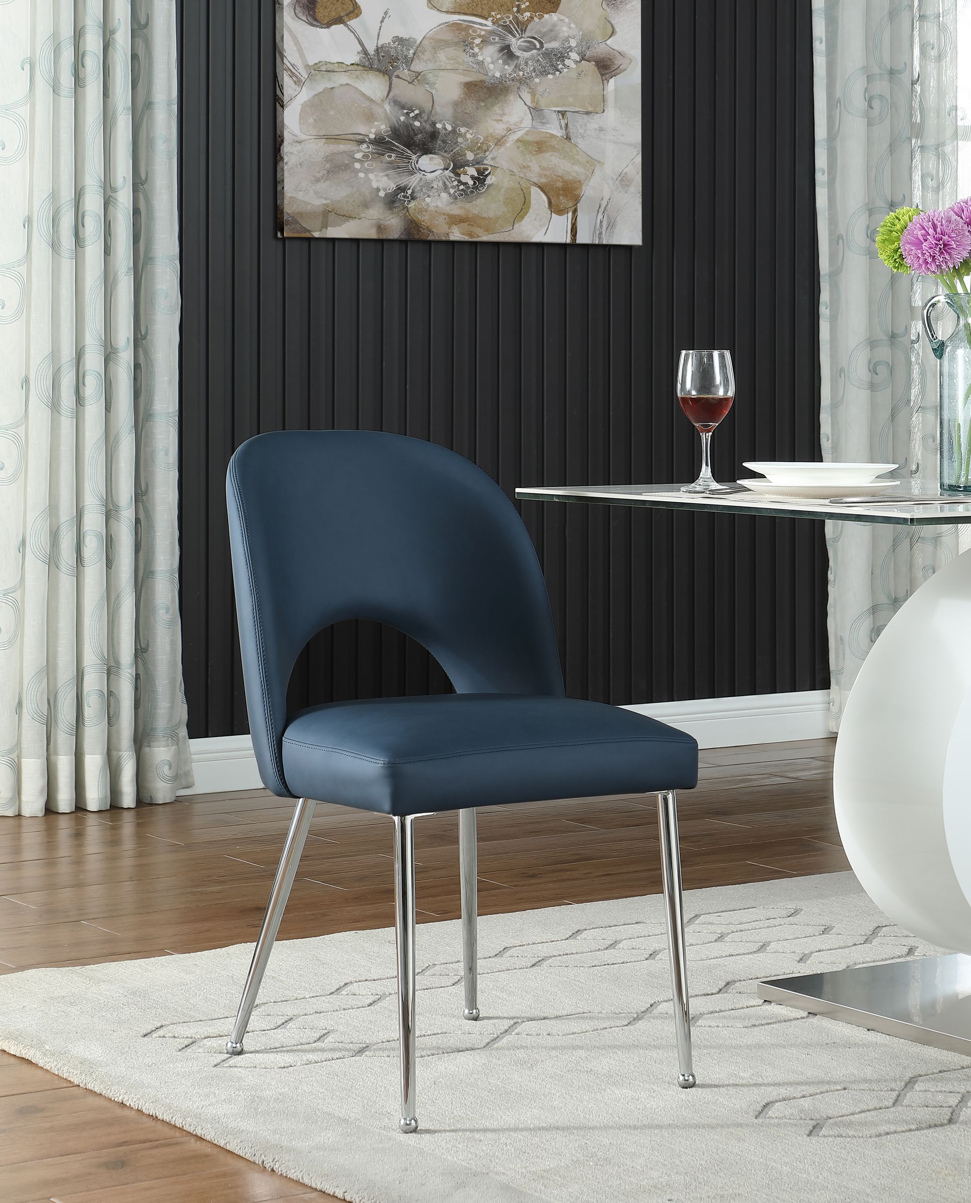 Logan Faux Leather Dining Chair with Chrome Ball Leg Design