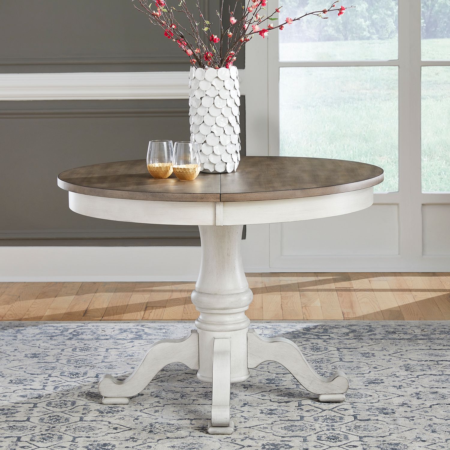 Ocean Isle Round Wood Extendable Dining Table