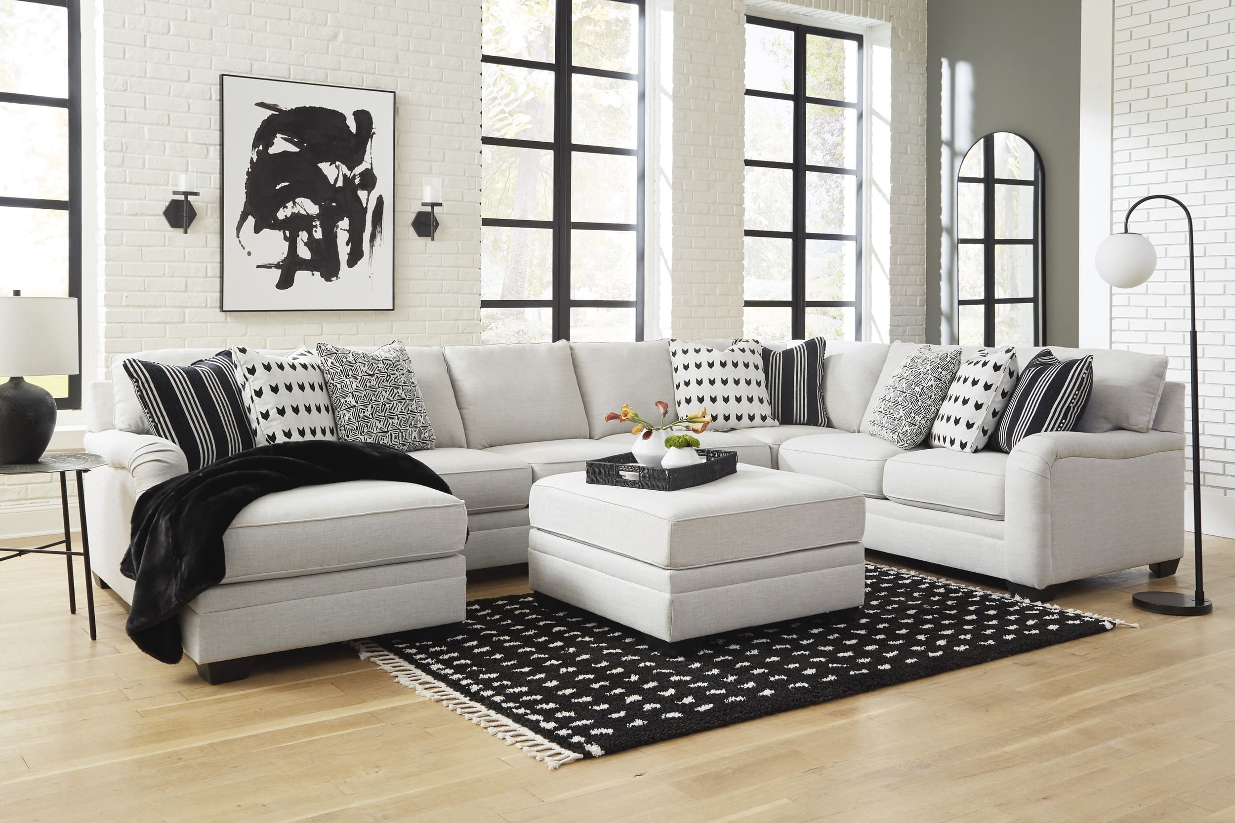 Huntsworth Dove Gray Sectional Sofa chaise And Ottoman