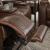 The Man-Den Leather Power Reclining Loveseat w/Console