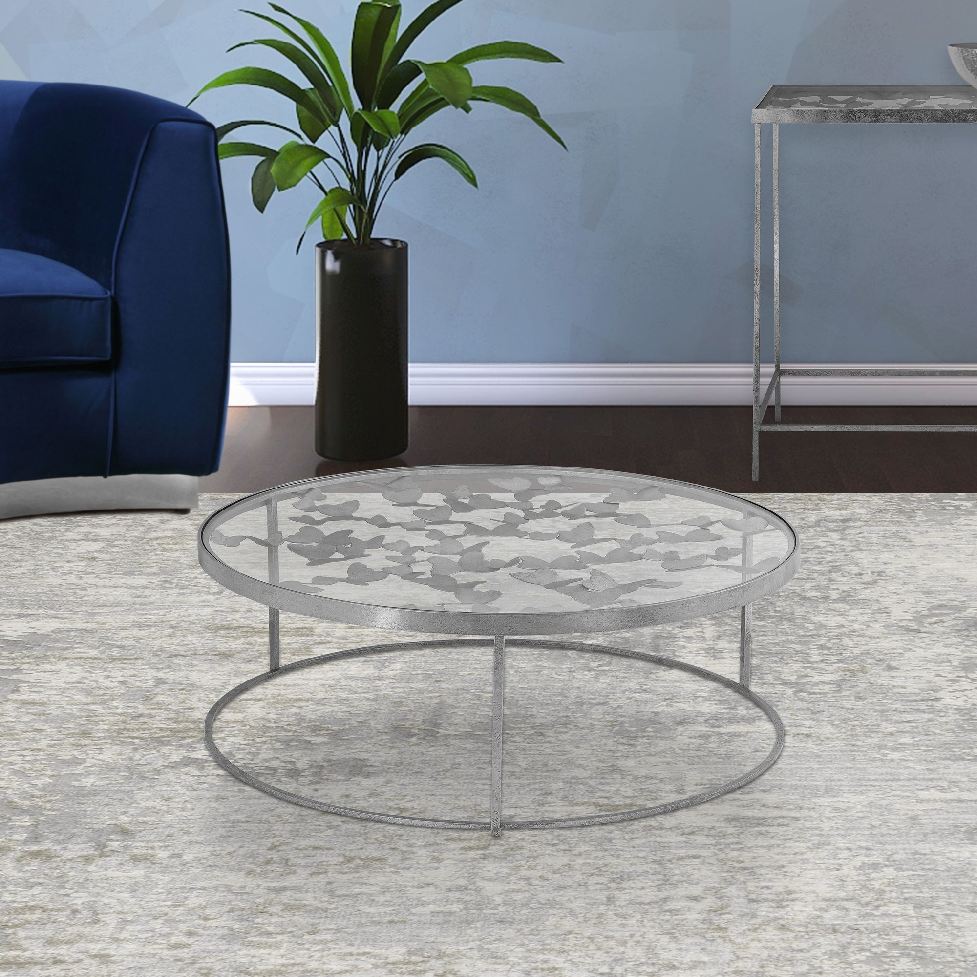 Butterfly 31" Round Glass Coffee Table with Silver Foil Base