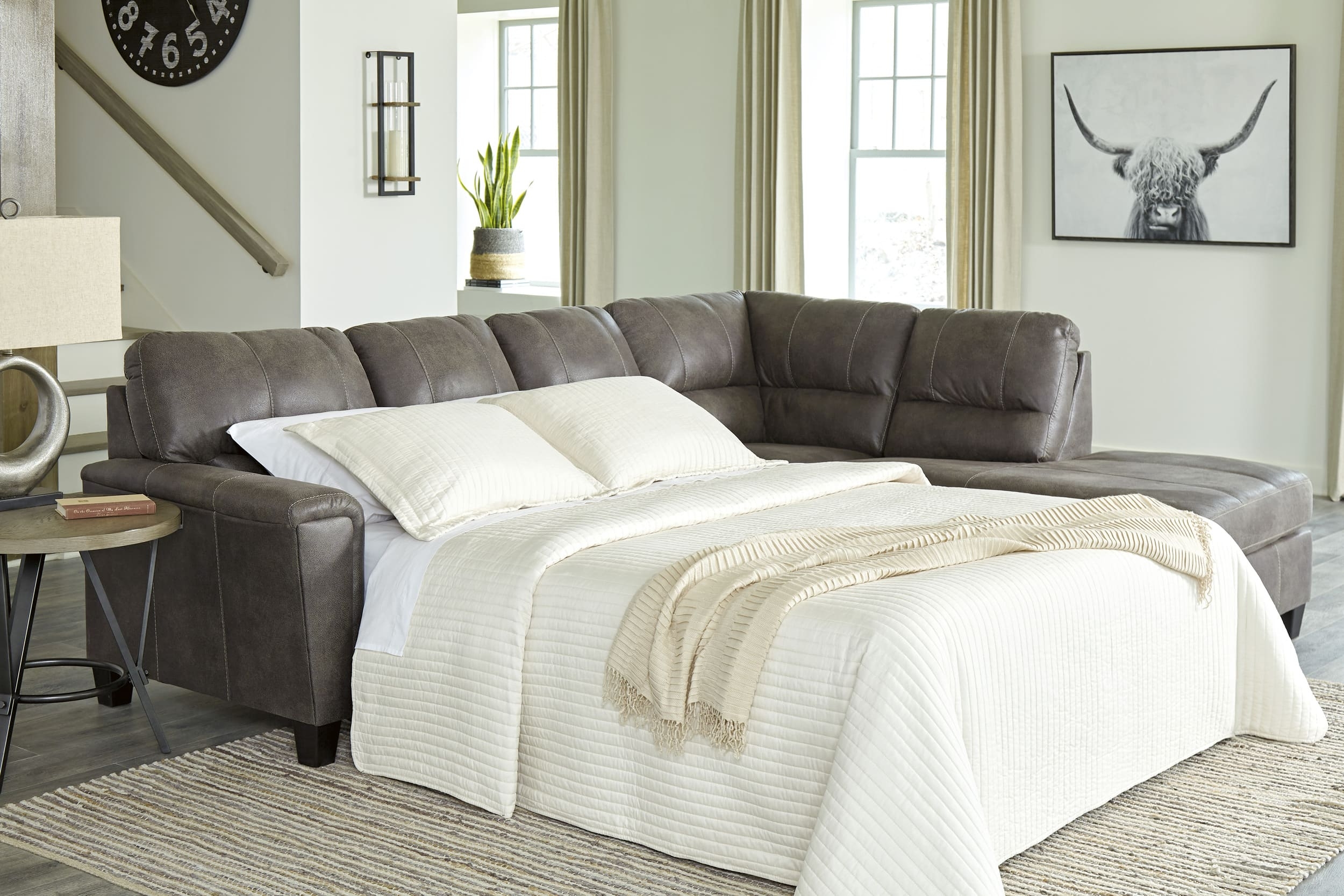 Ashley Navi 2-Piece Sectional Sofa Sleeper Chaise by Ashley
