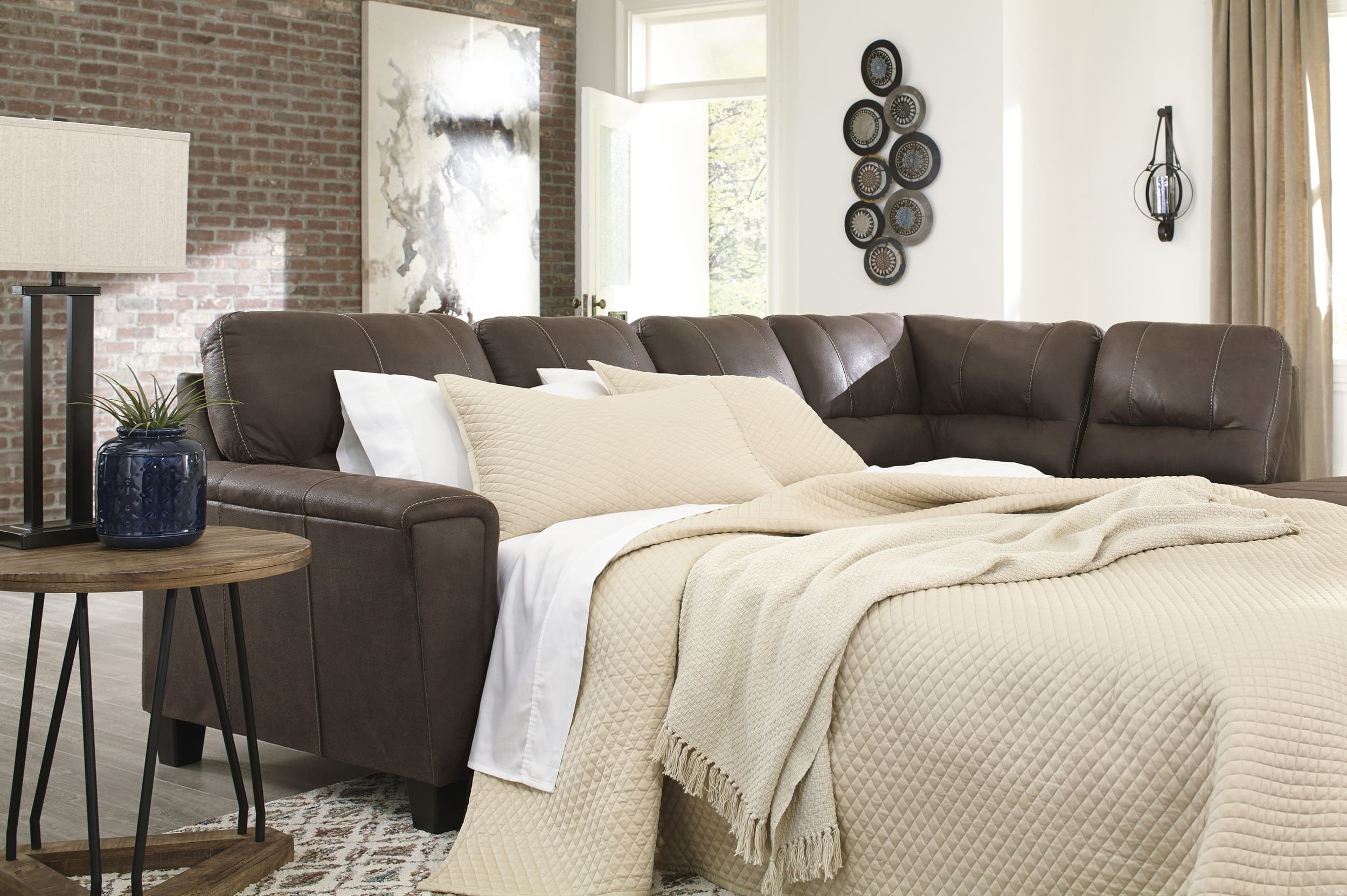 Ashley Navi 2-Piece Sectional Sofa Sleeper Chaise by Ashley