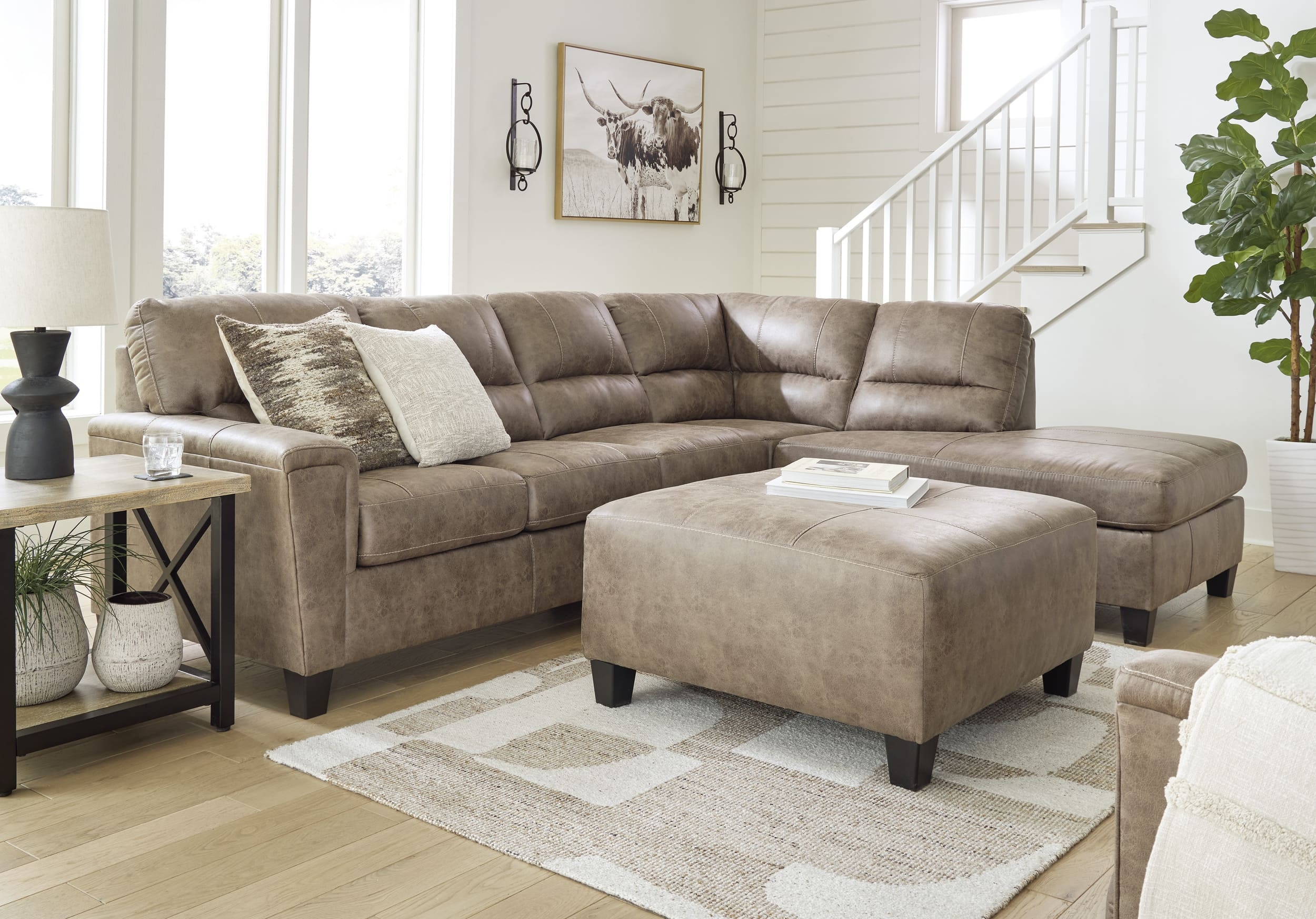 Navi Faux Leather Sectional Sofa And Ottoman