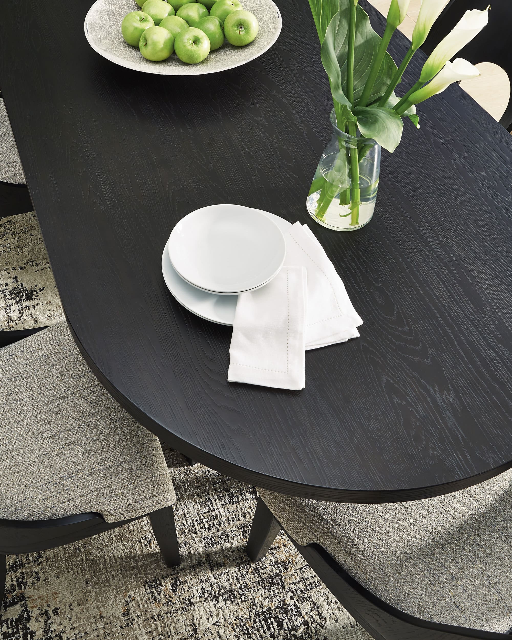 Rowanbeck Oval Wood Dining Table in Black | Ashley Furniture