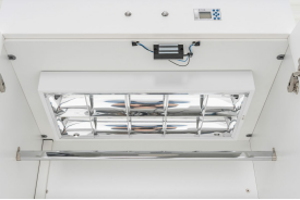 Disinfection cabinet for clothes with UV-C fluorescent lamps