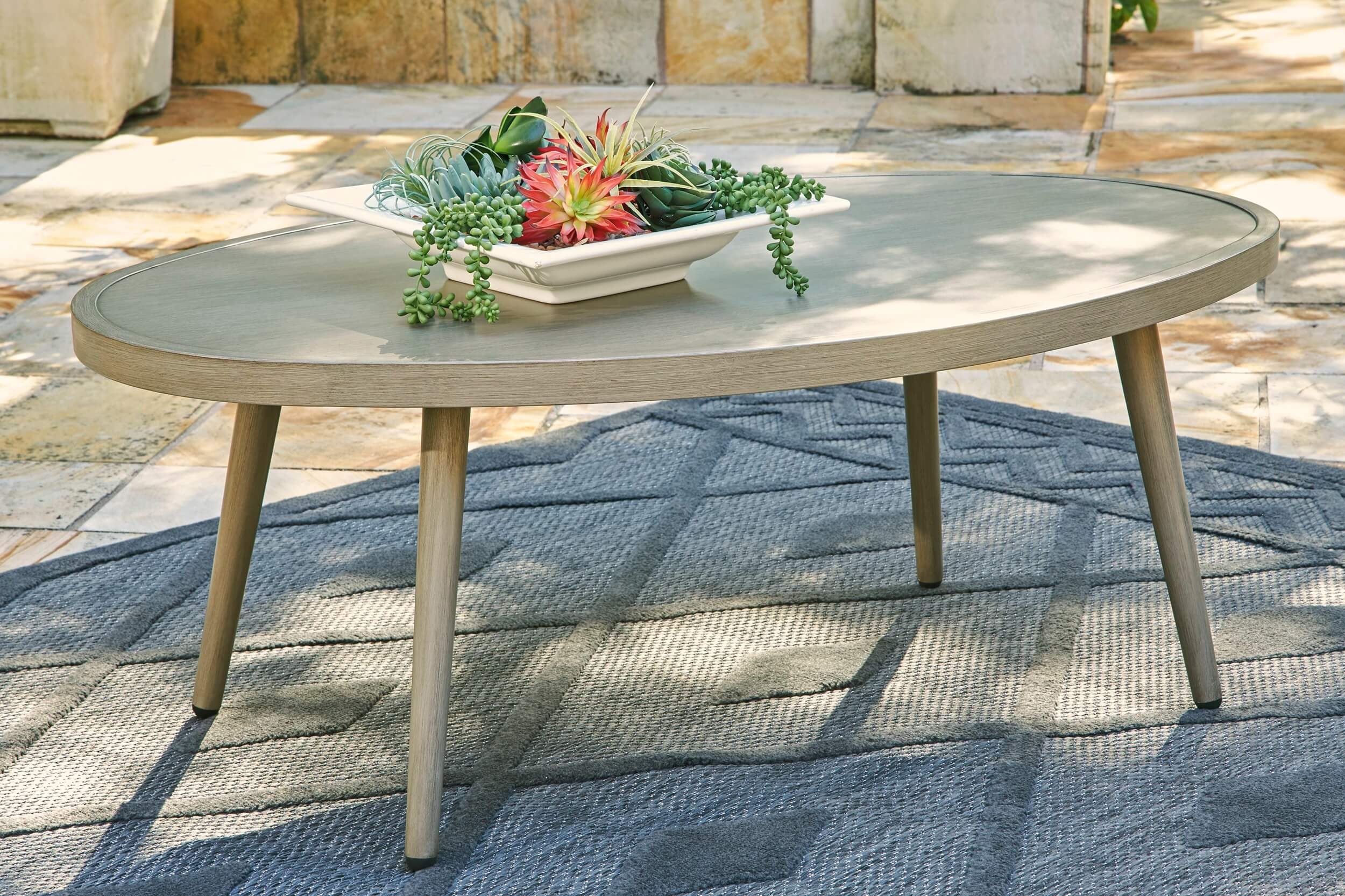Swiss Valley Outdoor Oval Wood Look Coffee Table