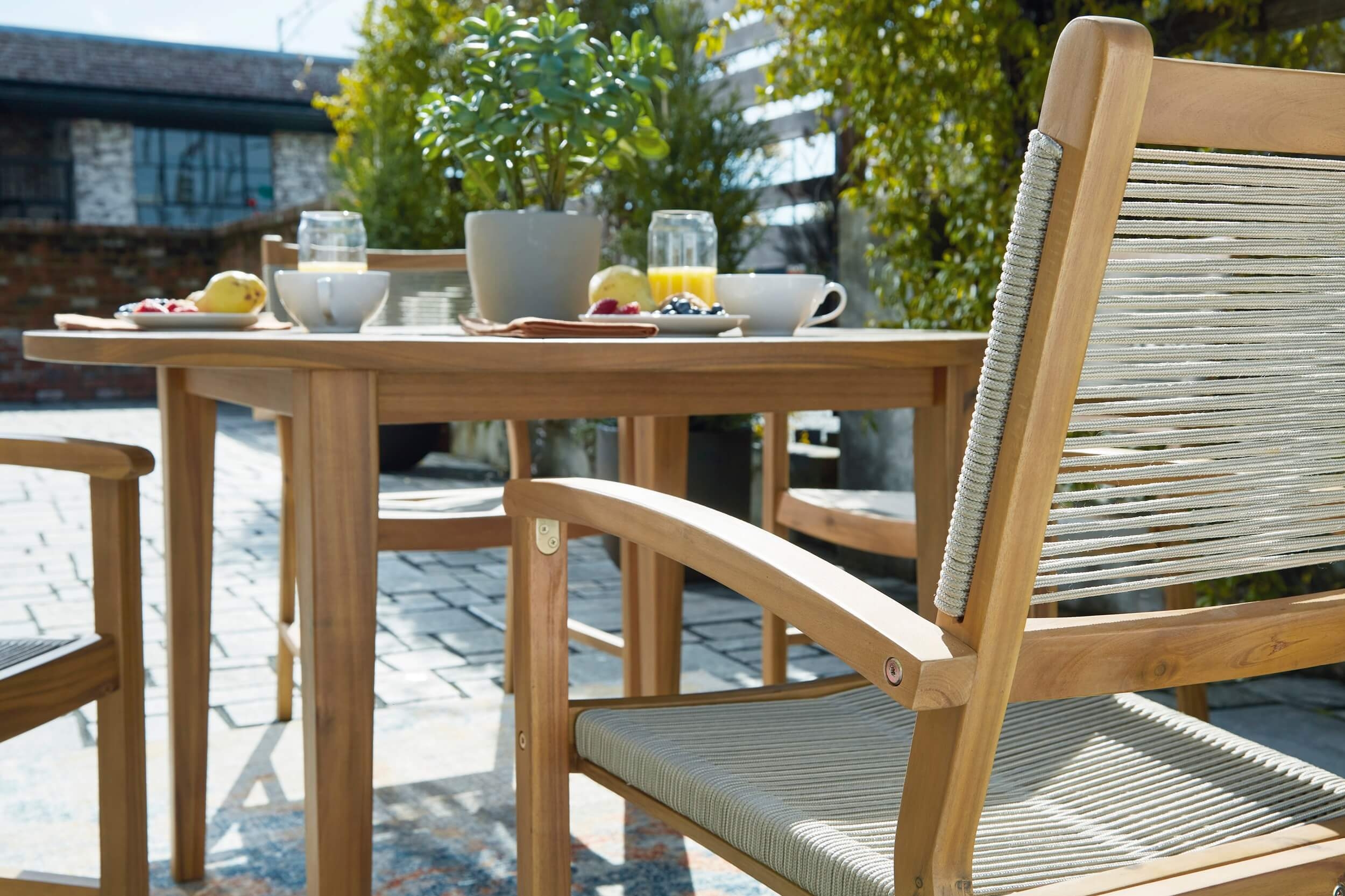 Janiyah Outdoor Acacia Wood Round Dining Set