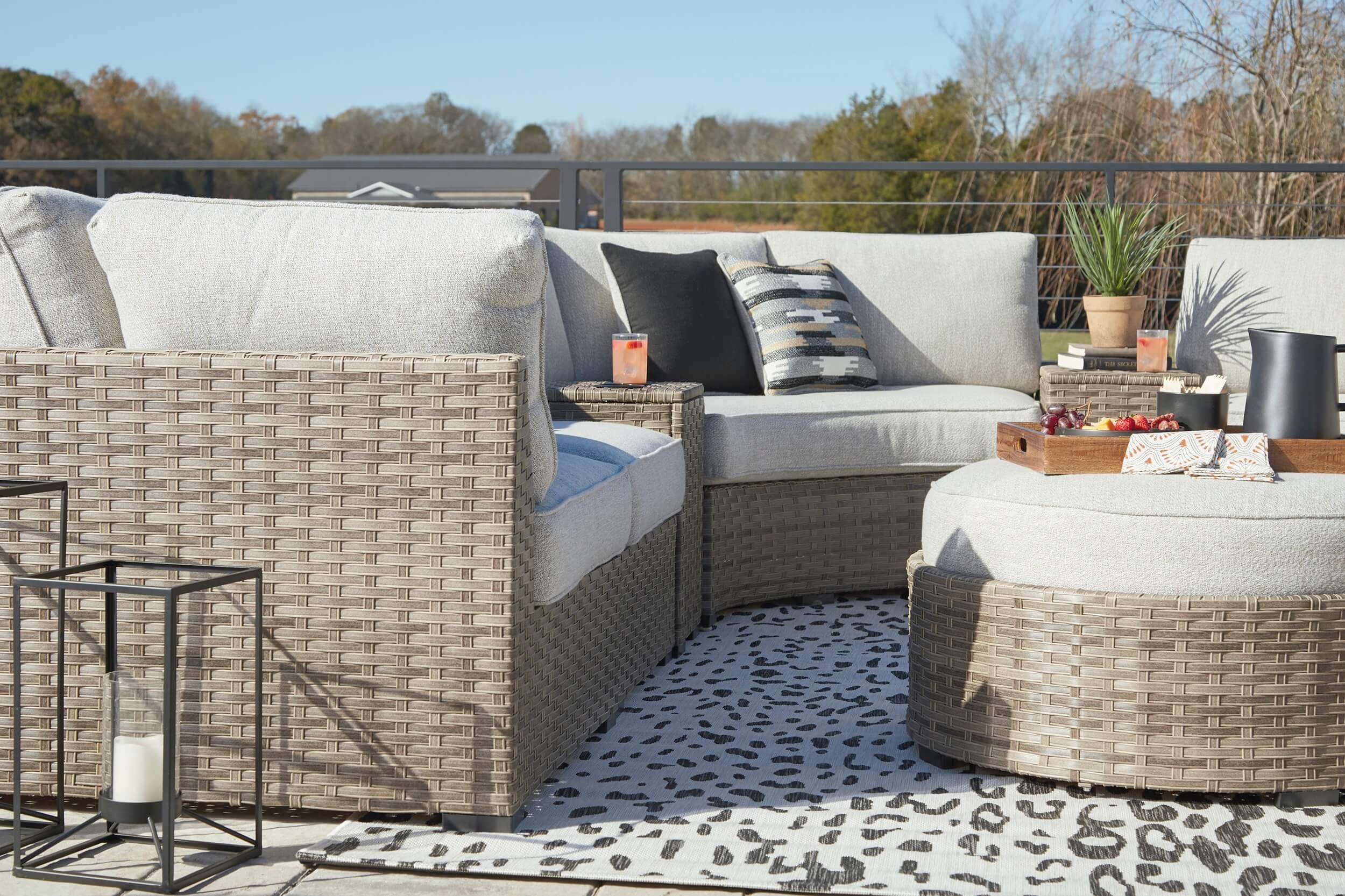 Calworth 9-Piece Outdoor Nuvella Fabric/Resin Wicker Sectional Sofa