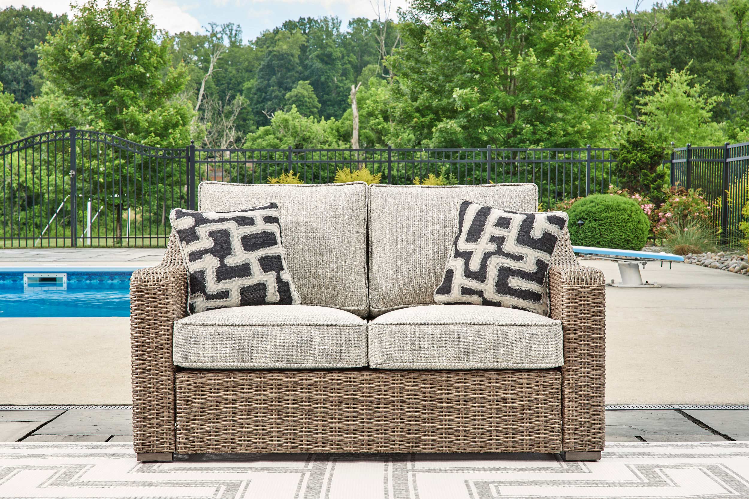Beachcroft Resin Wicker Outdoor Loveseat with Cushion