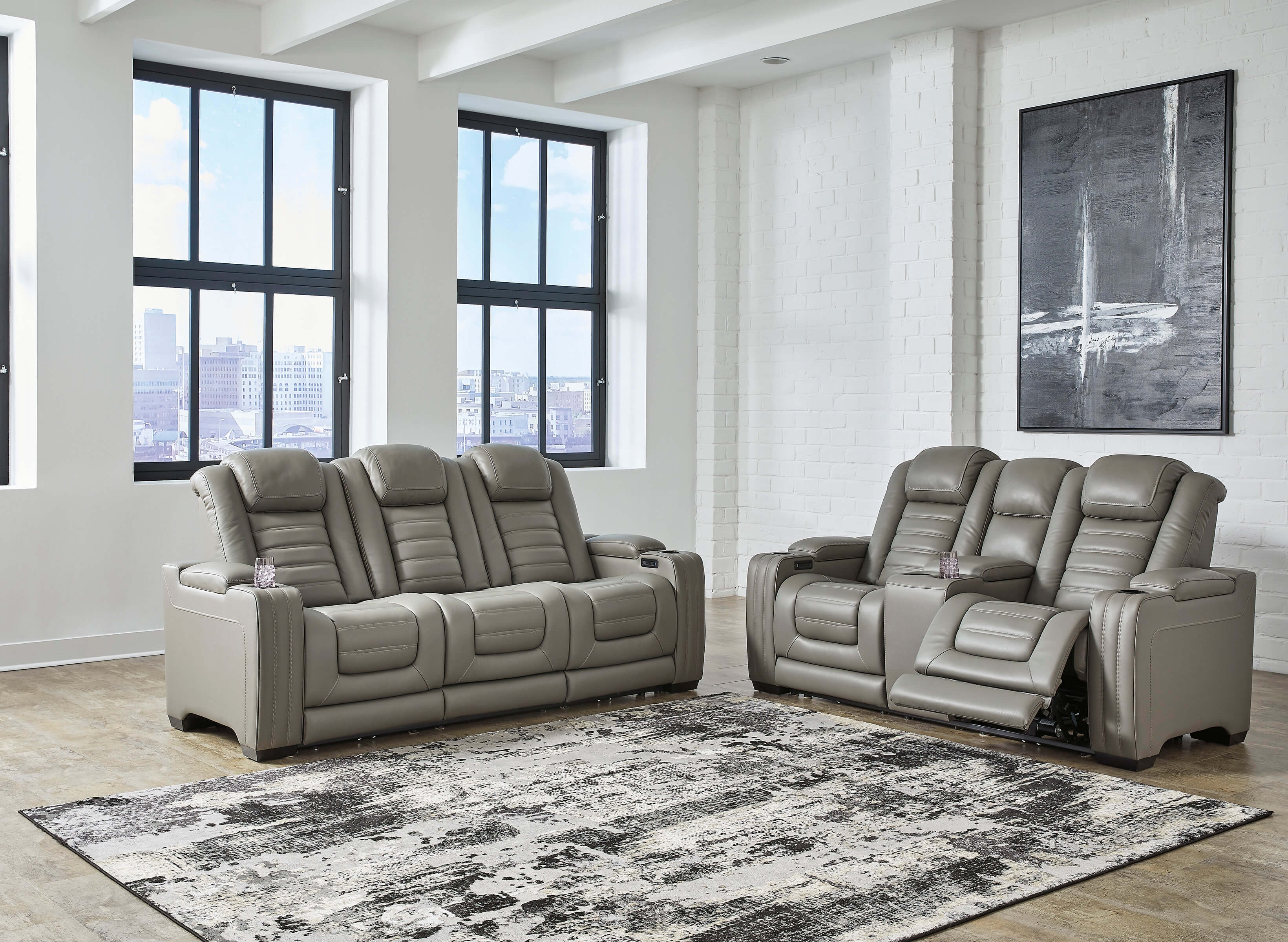 Backtrack Gray Power Reclining Sofa and loveseat
