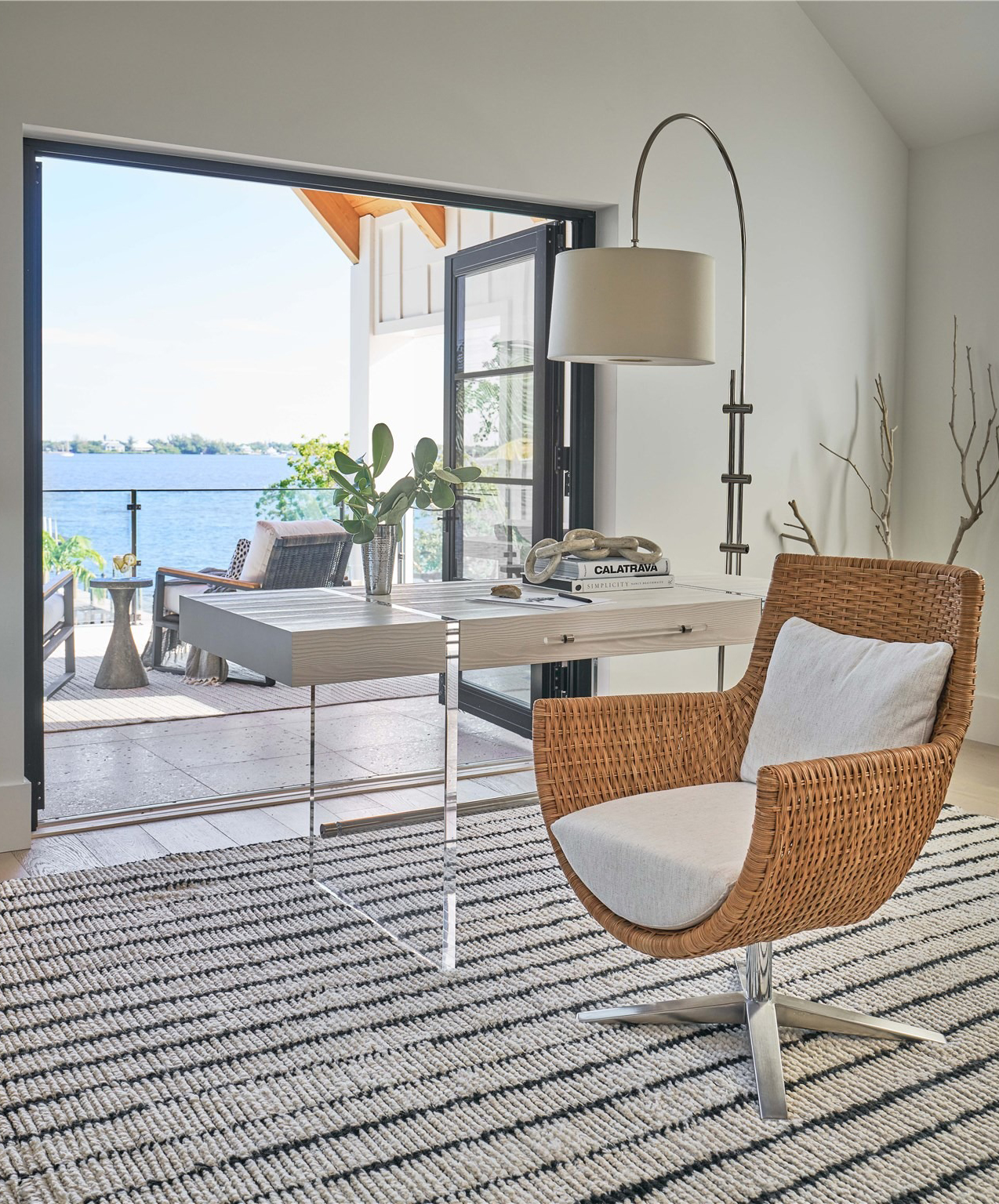 Sullivan Rattan Swivel Arm Chair