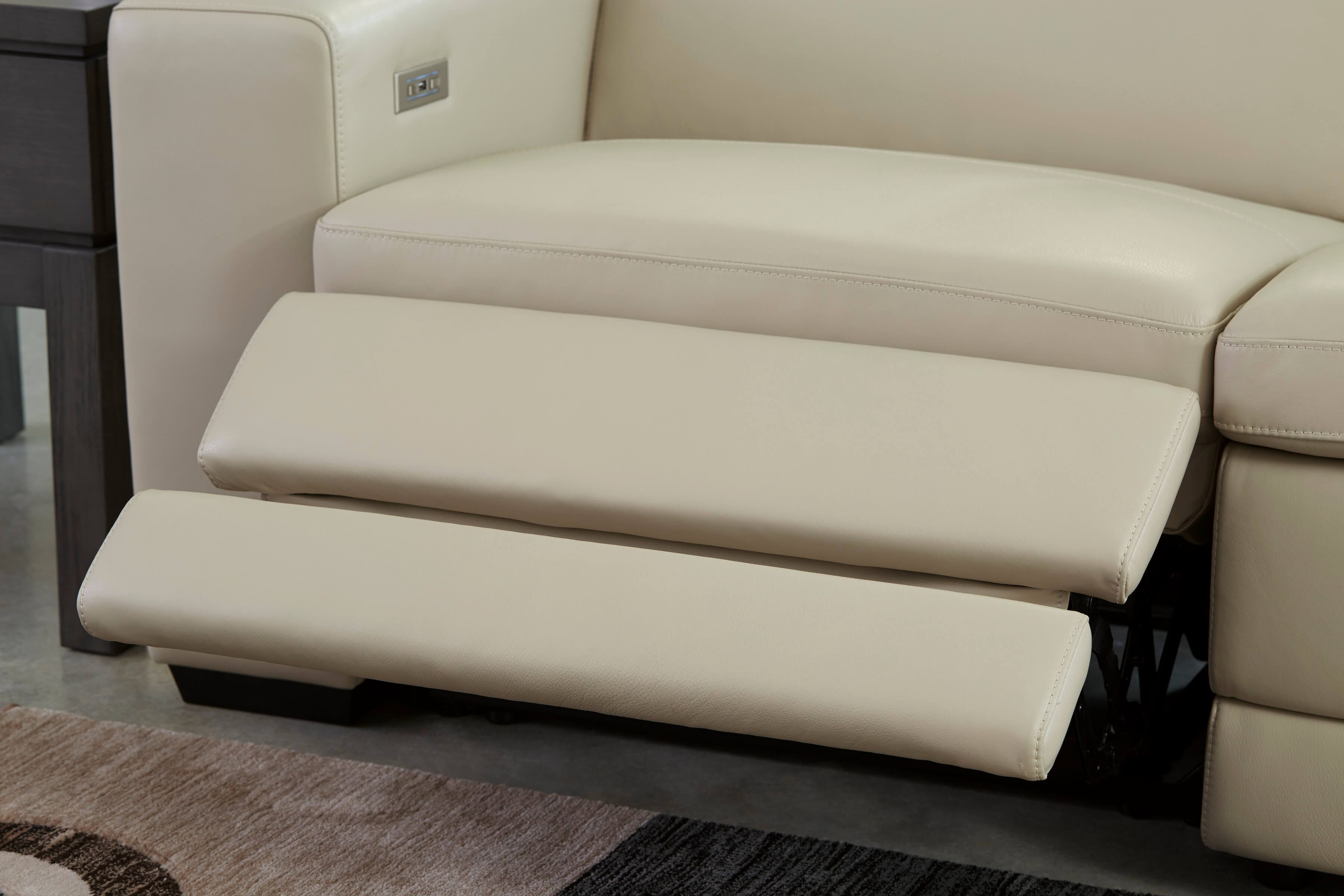 Texline Sand Leather Reclining Loveseat by Ashley