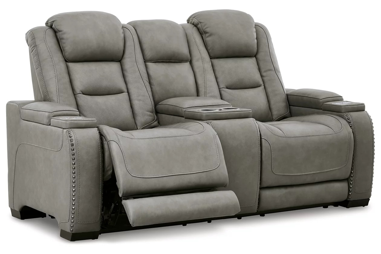 ashley man den sofa
