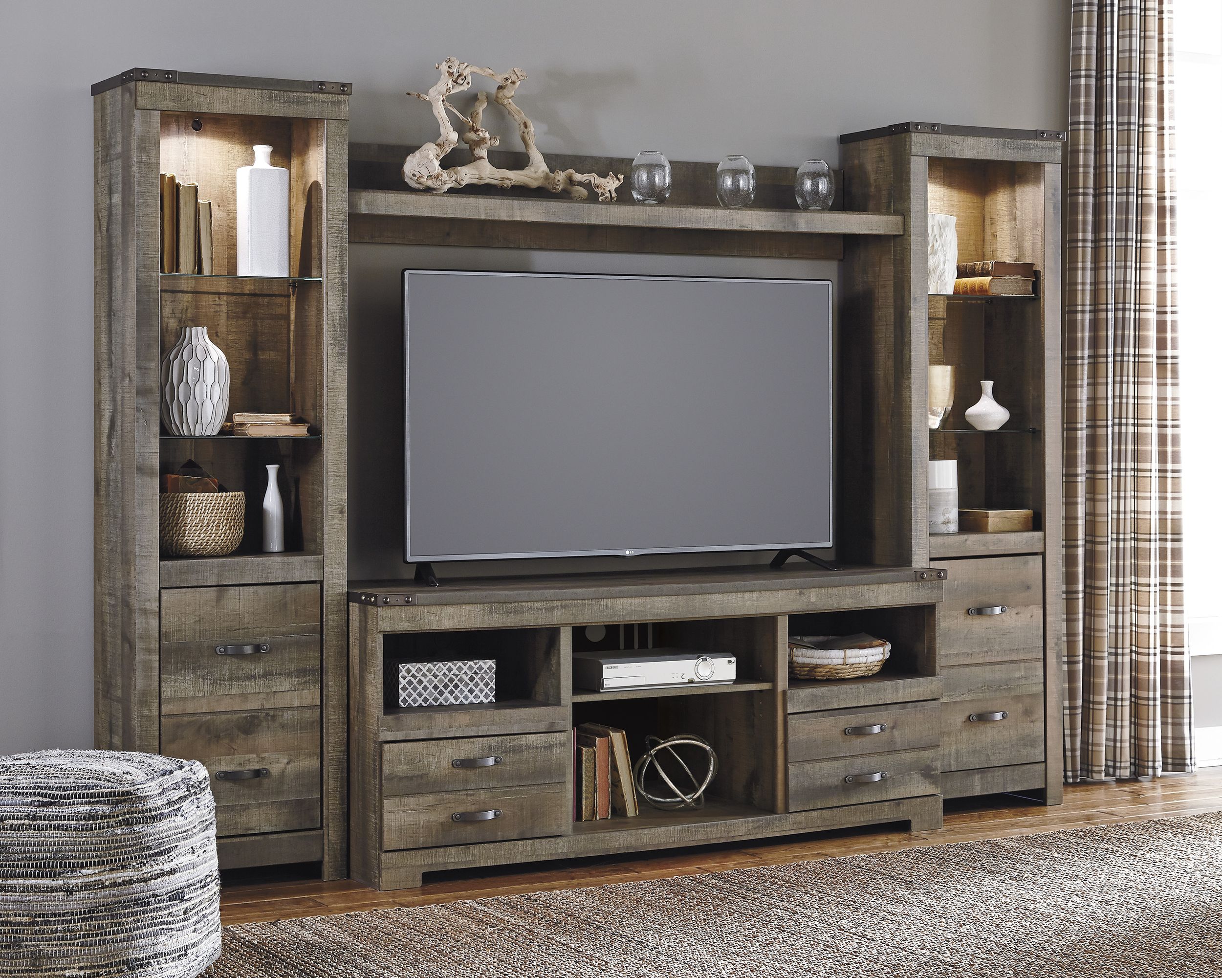 Trinell 4-Piece Rustic Entertainment Wall with Bridge - Brown